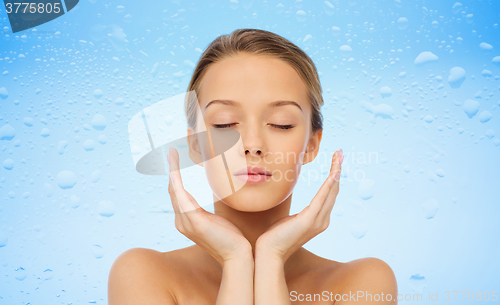 Image of young woman face and hands