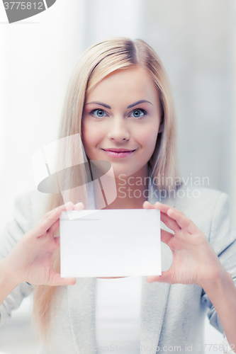 Image of woman with blank business or name card