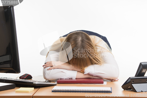 Image of Office worker sleeping on the job