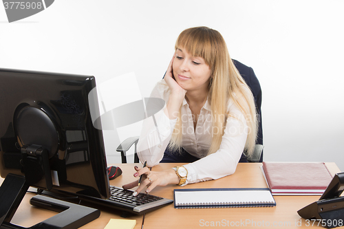 Image of Office employee working at a leisurely computer