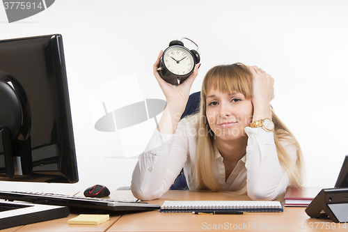 Image of Dull office employee knows what lies ahead time