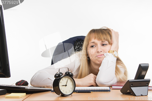 Image of  Dull morning office employee at work