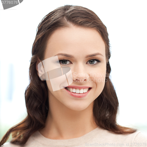 Image of happy smiling young woman face or portrait