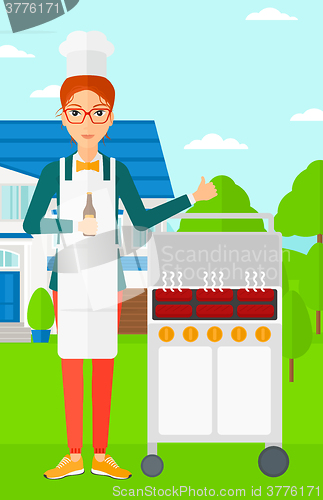 Image of Woman preparing barbecue.