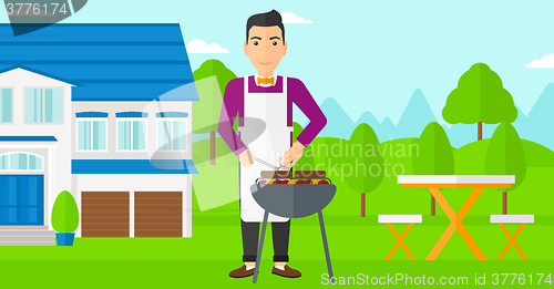 Image of Man preparing barbecue.