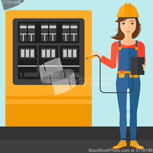 Image of Electrician with electrical equipment.