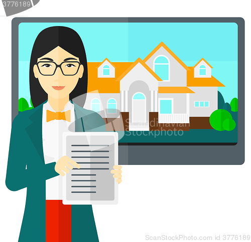 Image of Real estate agent offering house.