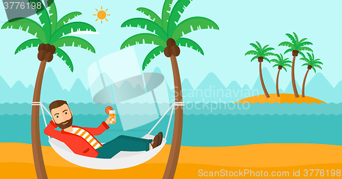Image of Man chilling in hammock.