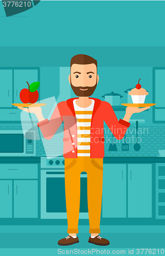 Image of Man with apple and cake.