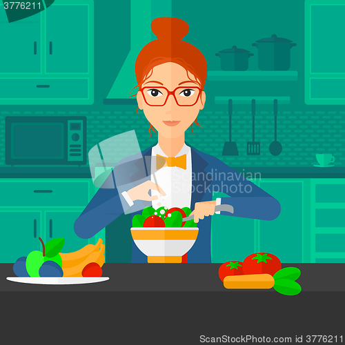 Image of Woman cooking meal.