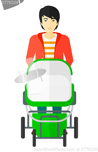 Image of Man pushing pram.