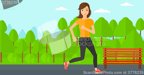 Image of Sportive woman jogging.
