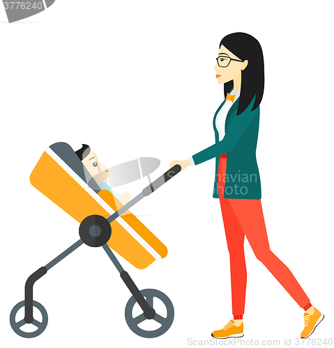 Image of Woman pushing pram.