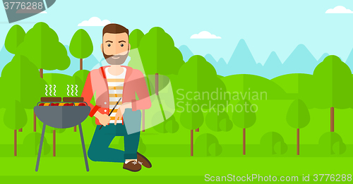 Image of Man preparing barbecue.