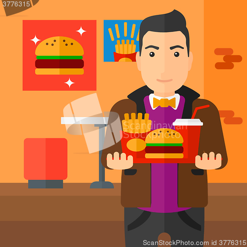Image of Man with fast food.
