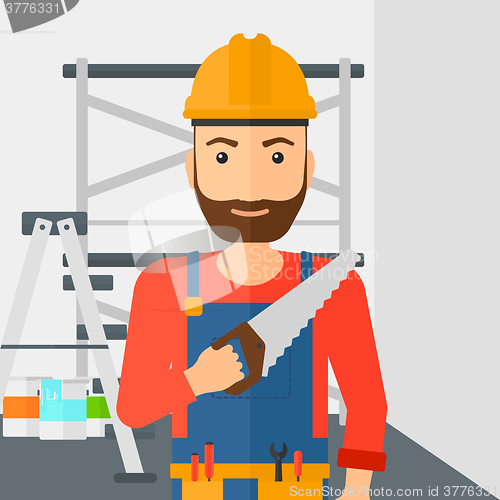 Image of Smiling worker with saw.