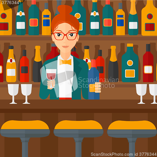 Image of Bartender standing at the bar counter.