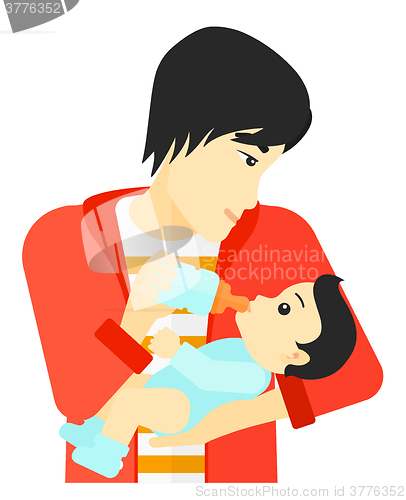 Image of Man feeding baby.