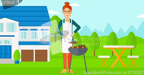 Image of Woman preparing barbecue.