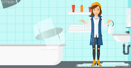 Image of Woman in despair standing near leaking sink.