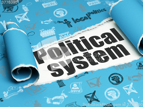 Image of Politics concept: black text Political System under the piece of  torn paper