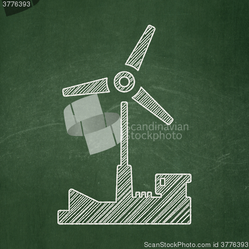 Image of Manufacuring concept: Windmill on chalkboard background