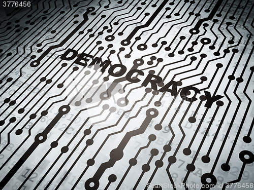 Image of Political concept: circuit board with Democracy