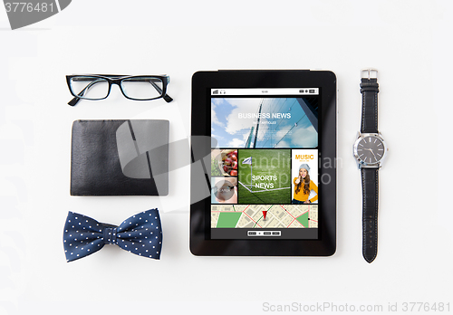 Image of tablet pc with web applications and personal stuff