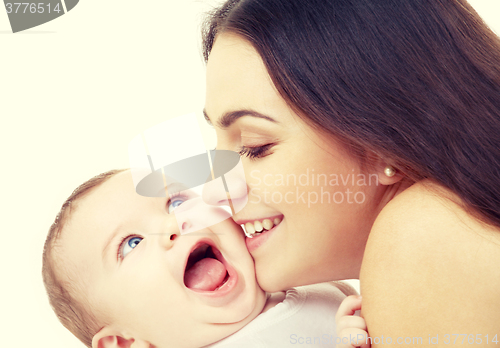 Image of mother kissing her baby