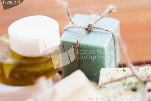 Image of close up of handmade soap bars on wood