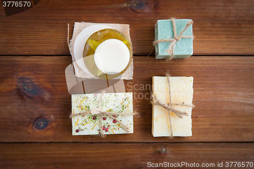 Image of close up of handmade soap bars on wood