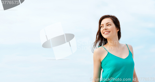 Image of girl standing on the beach