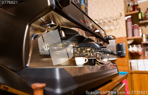 Image of close up of coffee machine at cafe or restaurant