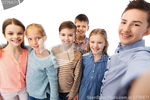 Image of happy children talking selfie