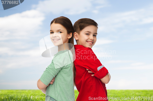 Image of happy boy and girl standing together