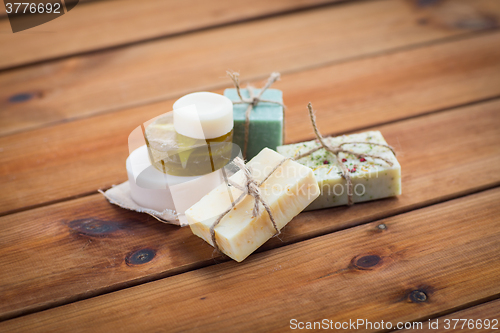 Image of close up of handmade soap bars on wood