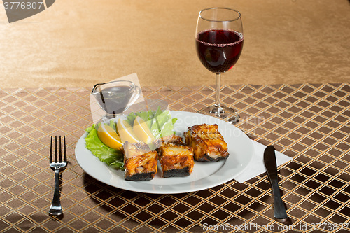 Image of fried catfish. delicious fatty fish on a plate