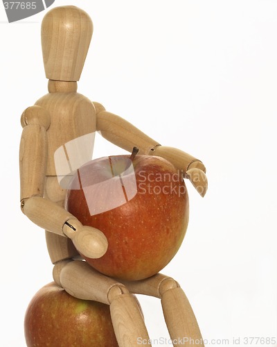 Image of mannequin with apples