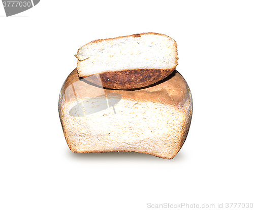 Image of homemade white bread with a piece cut off