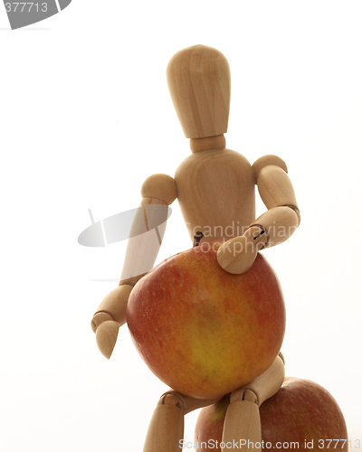 Image of mannequin with apples