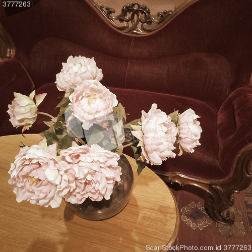 Image of Bouquet of roses in a vintage interior