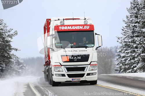 Image of White MAN Tank Truck on Winter Road