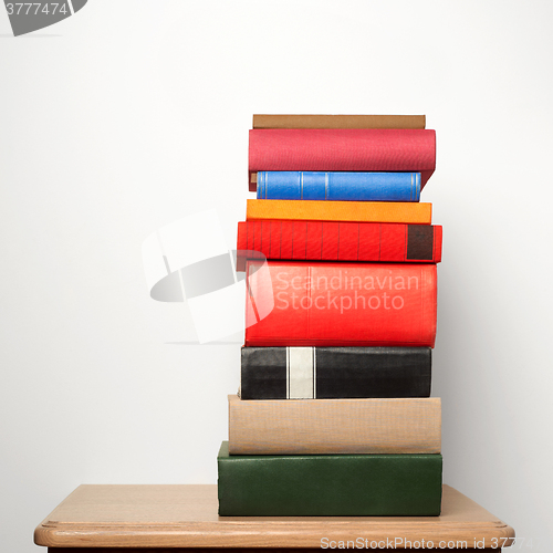 Image of stack of books on the table