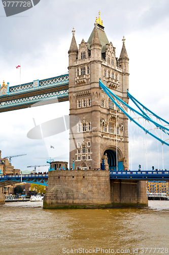 Image of london tower in   old bridge and the cloudy sky