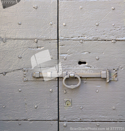 Image of abstract  house  door     in italy           closed   rusty