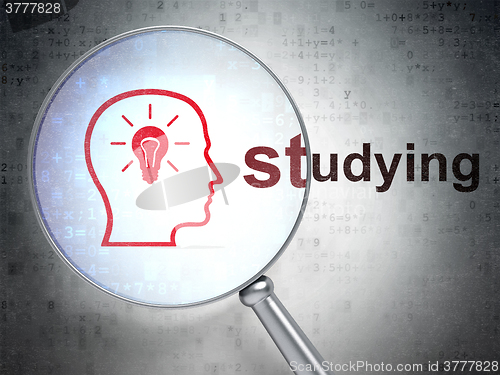 Image of Studying concept: Head With Lightbulb and Studying with optical glass