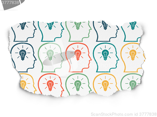 Image of Data concept: Head With Lightbulb icons on Torn Paper background