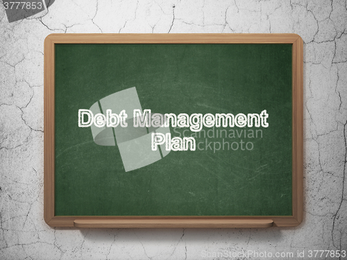 Image of Business concept: Debt Management Plan on chalkboard background
