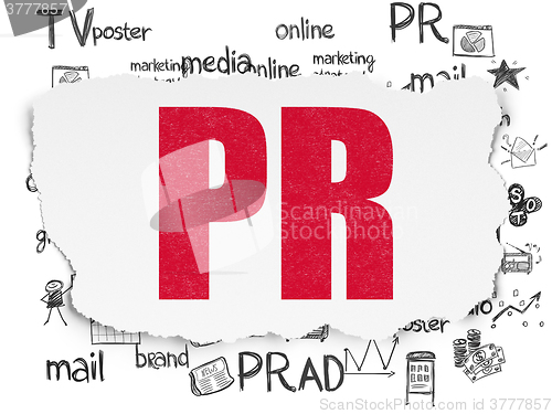 Image of Advertising concept: PR on Torn Paper background