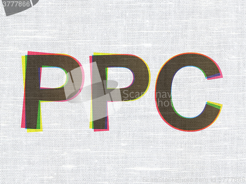 Image of Marketing concept: PPC on fabric texture background